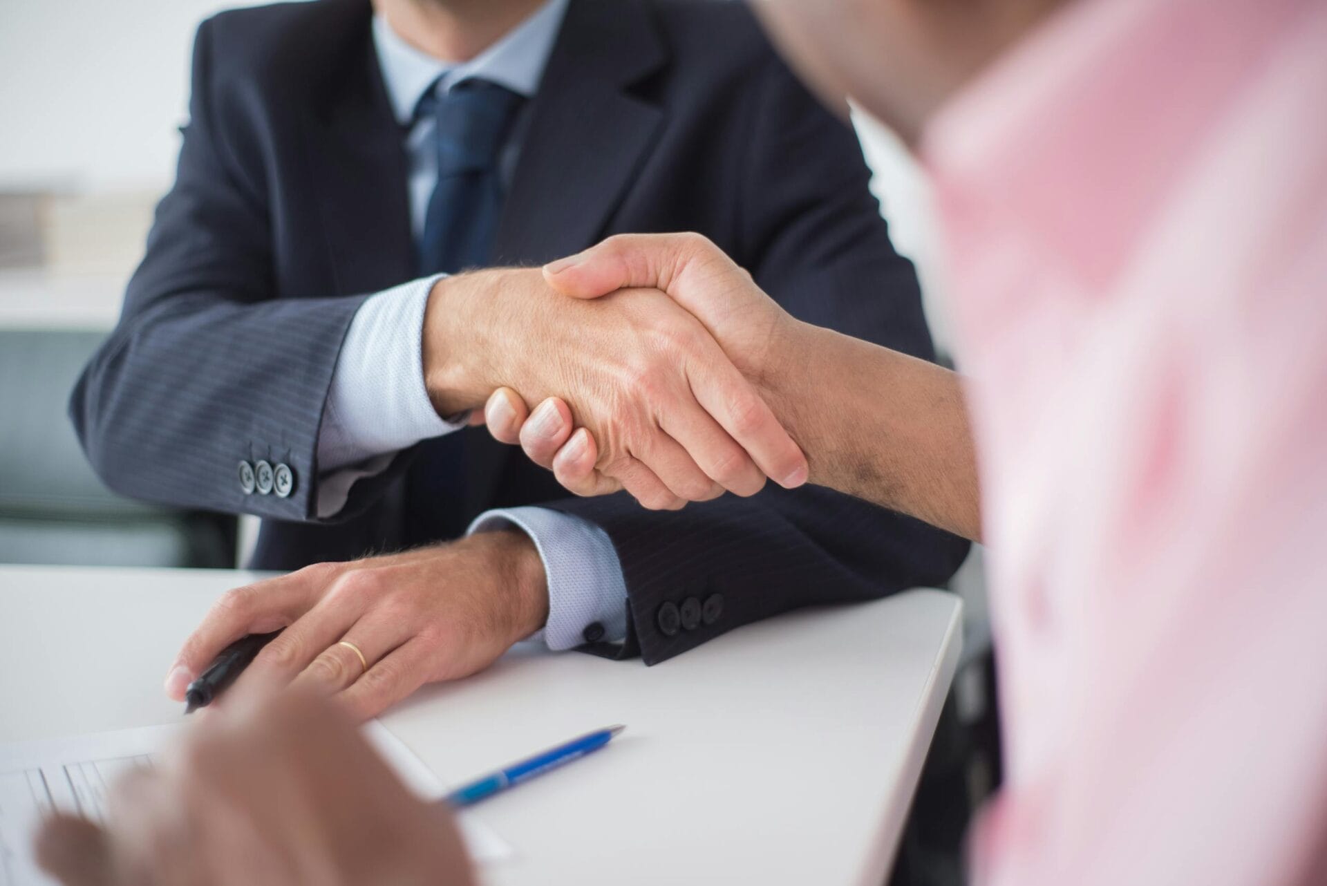 Close-up of Shaking Hands Between Men