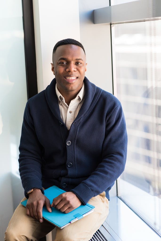 Man Wearing Blue Button-up Sweater