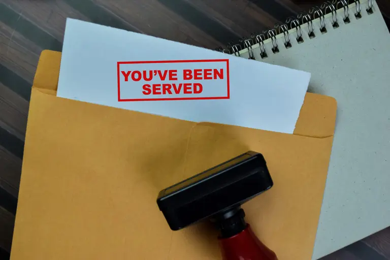 What Hours Can a Process Server Serve You? 2 picture of a an envolope with you have been served written on it
