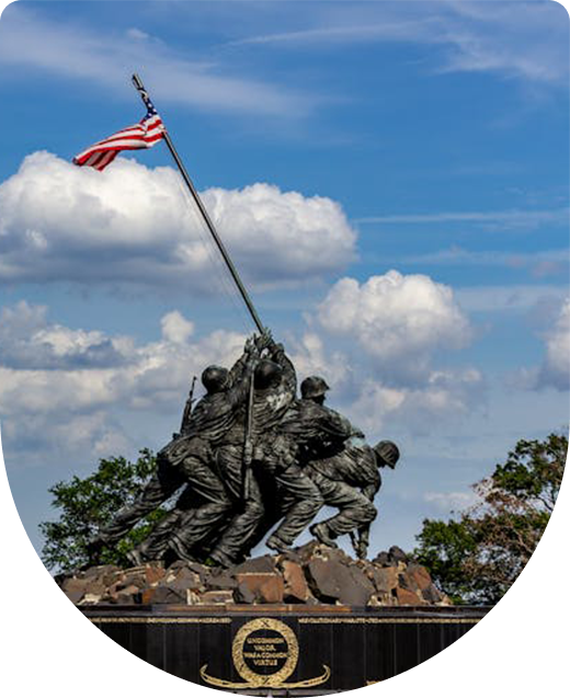 US Marine Corps War Memorial with American flag.